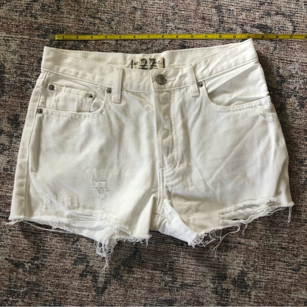 Free People White high waisted cut off denim shorts with button down fly